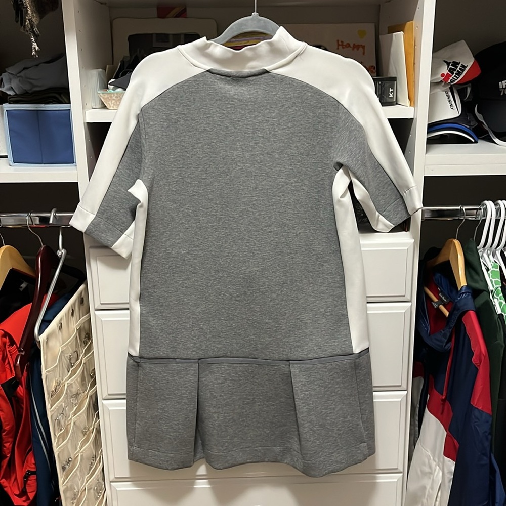 Nike sport dress with pleated bottom. Size small.